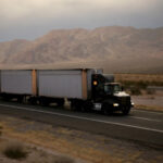Large truck traveling along highway: Lorenzo & Lorenzo Truck Accidents Blog