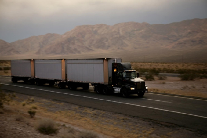 Large truck traveling along highway: Lorenzo & Lorenzo Truck Accidents Blog