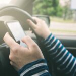 driver using cell phone while driving