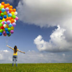 Woman with many balloons: Lorenzo & Lorenzo Legal Commentary Blog