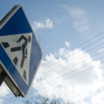 Blue crosswalk road sign: Lorenzo & Lorenzo Auto & Motorcycle Accidents Blog