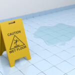 wet floor caution sign: Lorenzo & Lorenzo Premises Liability Blog